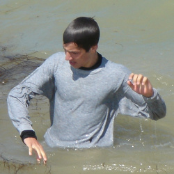 Swimming in a sweatshirt