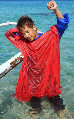 swimming in a poncho