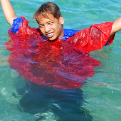swimming in ponchos