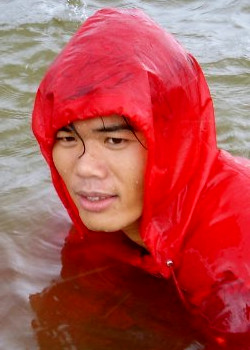 red poncho lake rain hiking cape walk